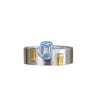 A sterling silver ring with a baguette cut blue topaz centerpiece and yellow brass accents on the band.