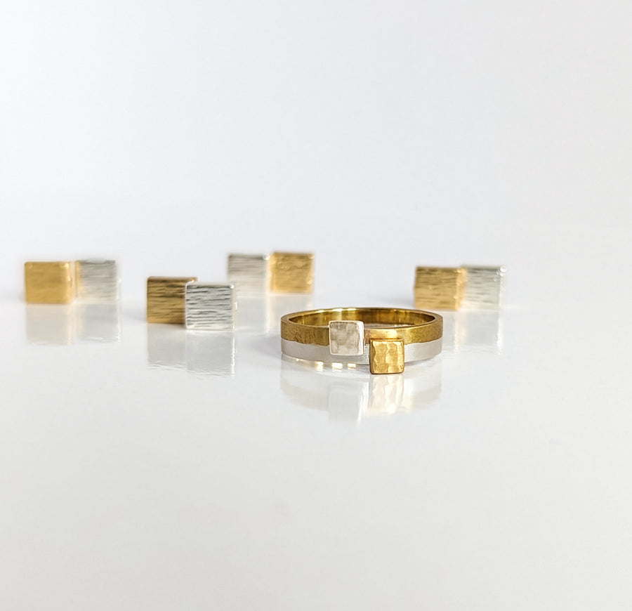  single band with a seamless join of brass and sterling silver.