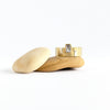 Crisp clear zircon. Wide brass band. And just a touch of sterling.
The Simone is modelled off our ever popular Artic ring