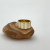 A wide band ring with yellow brass and sterling silver vertical bands